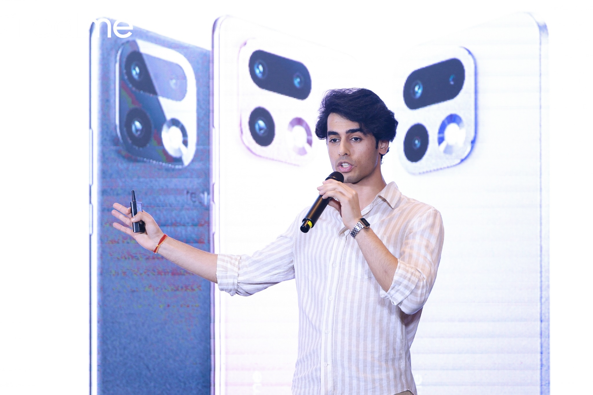 Tanishq presenting a smartphone launch